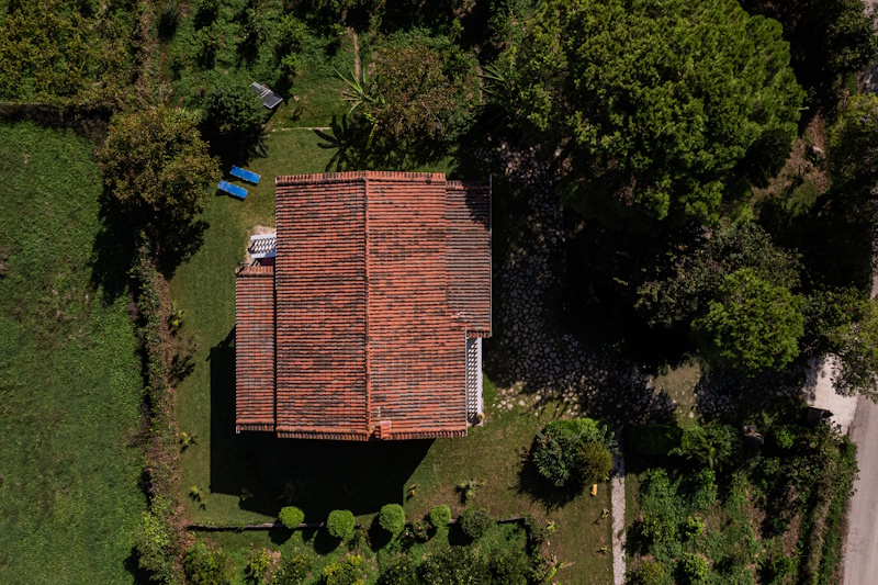 Top view of Selini Villa in Kalithea with tiled roof and surrounding garden