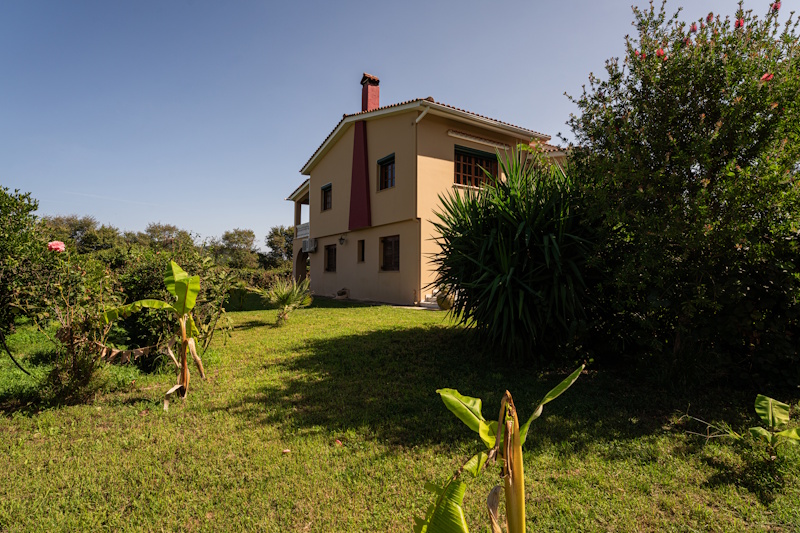 Side exterior view of Selini Villa in Kalithea with garden
